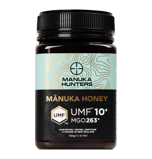 A jar of Mānuka Honey 10+ UMF™ (MGO 263+) with a label indicating the product details and branding - Manuka Hunters