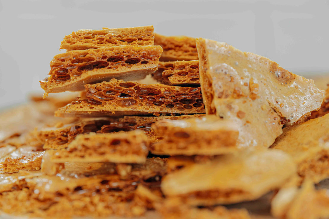 Thick slices and chunks of honeycomb (hokey pokey) using syrup and manuka honey