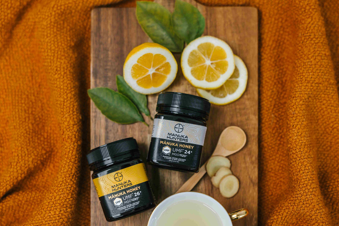 2 manuka hunters honey jars, with lemon slices and ginger