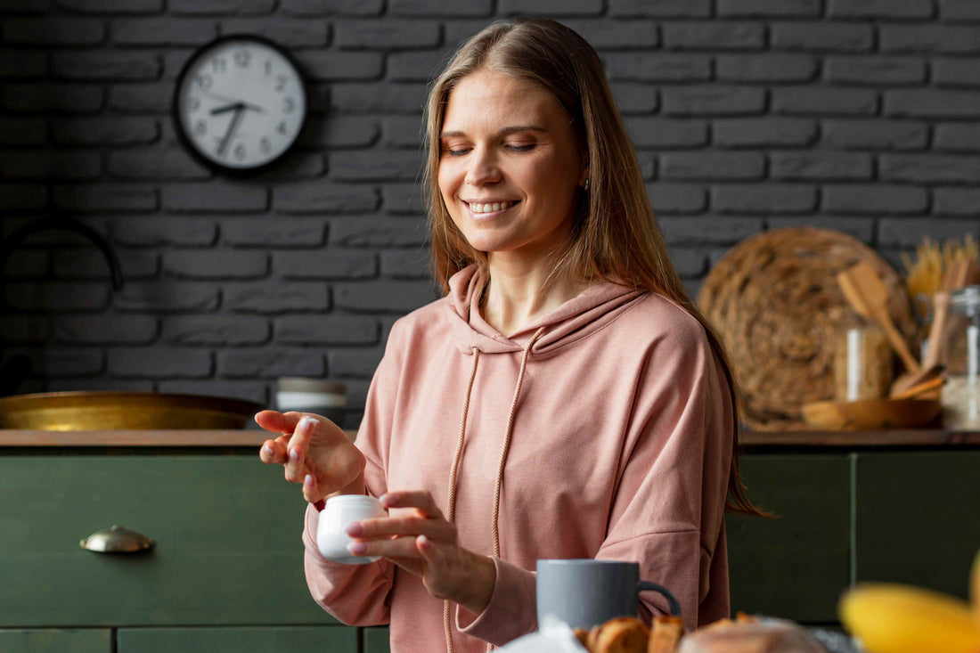 woman-holding-container - happily busy in the kitchen
